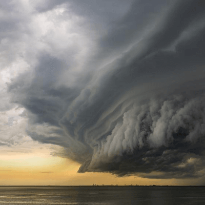 Dark storm cloud over flat landscape